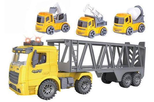 Lastbilen med autotransporter og 3 mindre køretøjer.